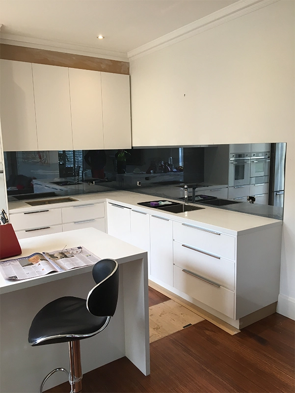 Custom glass kitchen splashback installed in a modern Hervey Bay kitchen